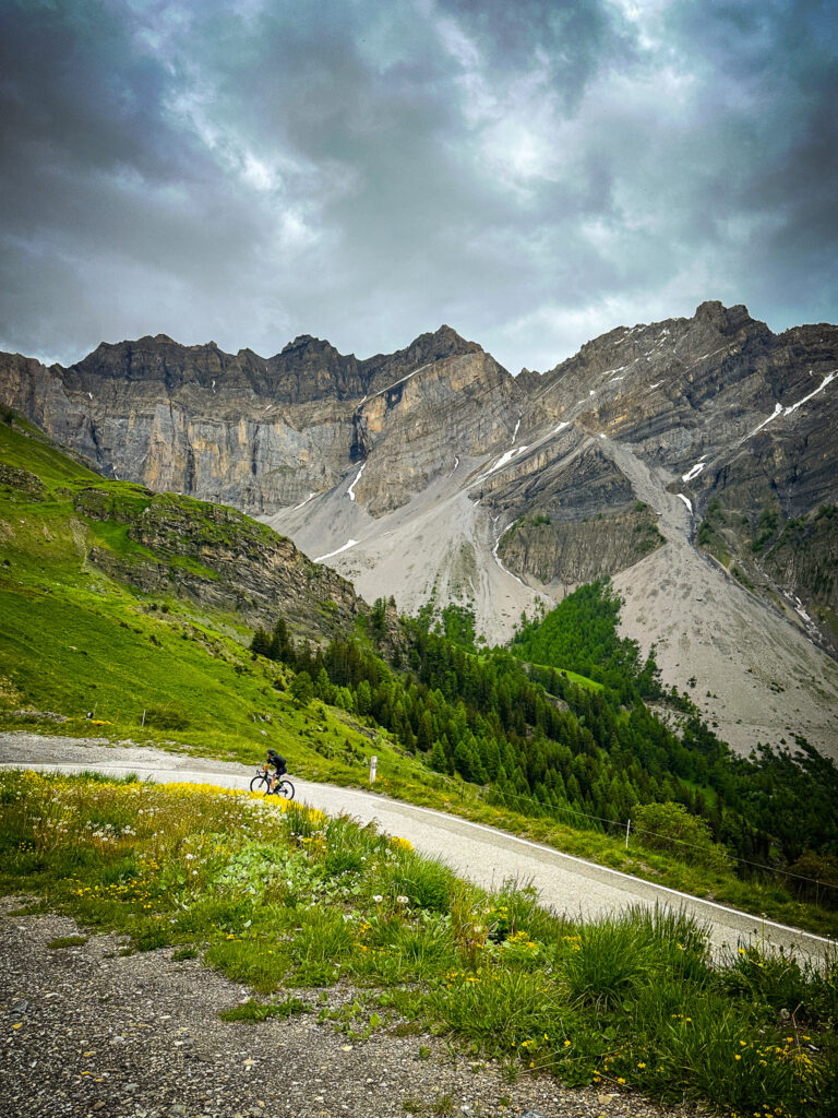 Cyclist climbing the Sanetsch Pass in Valais - Wallis